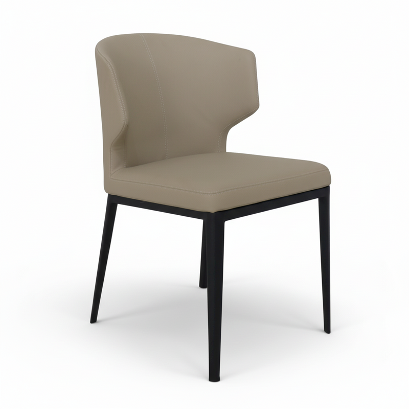 Light taupe dining chair with arched backrest and padded seat, black legs
