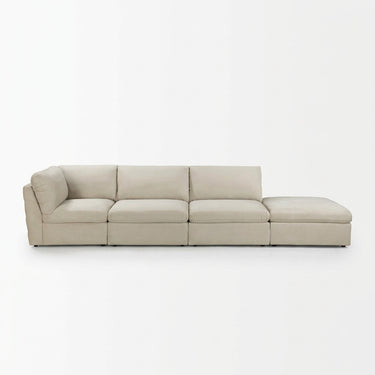 Light beige modular sectional sofa with wide arms and multiple seat cushions
