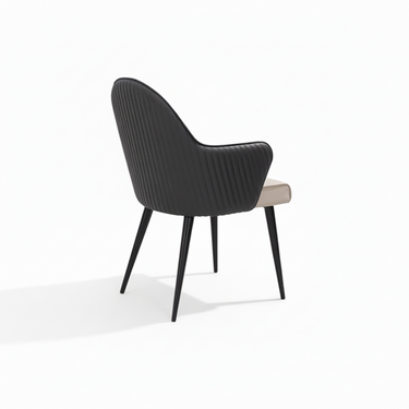 Black ribbed upholstered armchair with padded armrests and black tapered legs