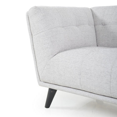 Light gray 3-seater sofa armrest and seat cushion detail with black tapered leg