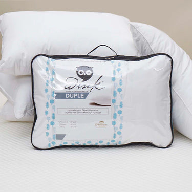 Double pillow in clear bag with blue floral trim and black piping, hanging handle