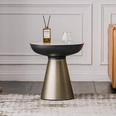 Round black side table with gold pedestal base