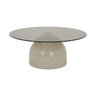 Center table with wide round glass top and glossy pedestal base, light gray-beige