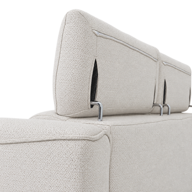 Ivory 2-seater sofa close-up with textured upholstery, curved back, and visible metal brackets