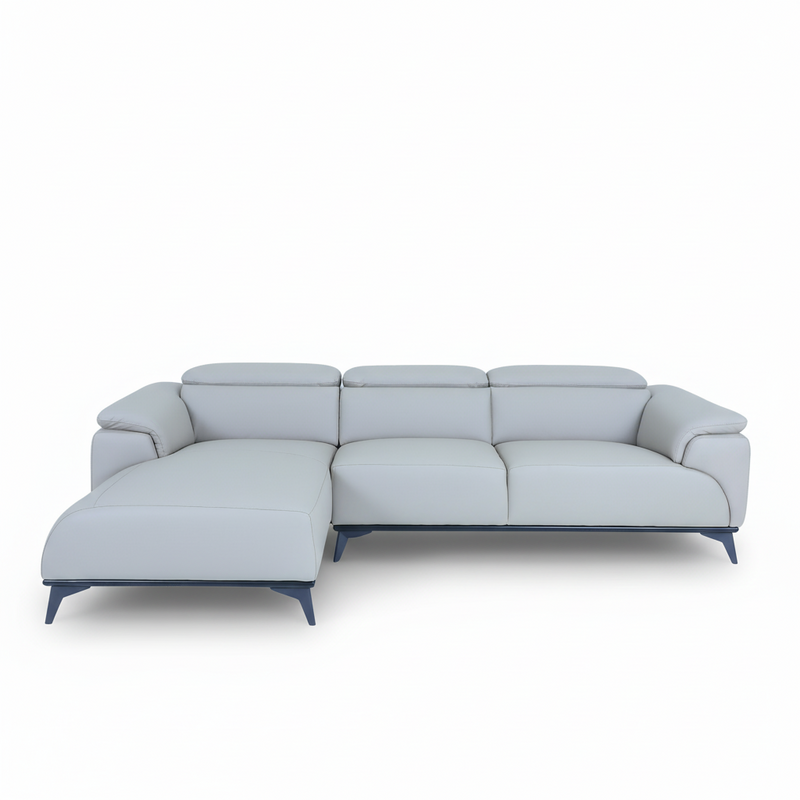 Light gray left sectional sofa with chaise and padded armrests, tufted cushions.