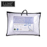 Polyester fiber pillow with black piping, sealed in clear storage bag