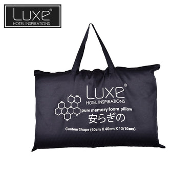 Black contour memory foam pillow in printed tote-style bag with handles