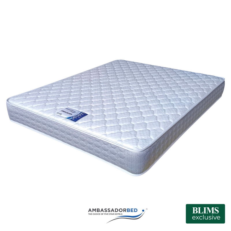 Comfortzen mattress by Ambassador Bed with light blue quilted surface and thick border