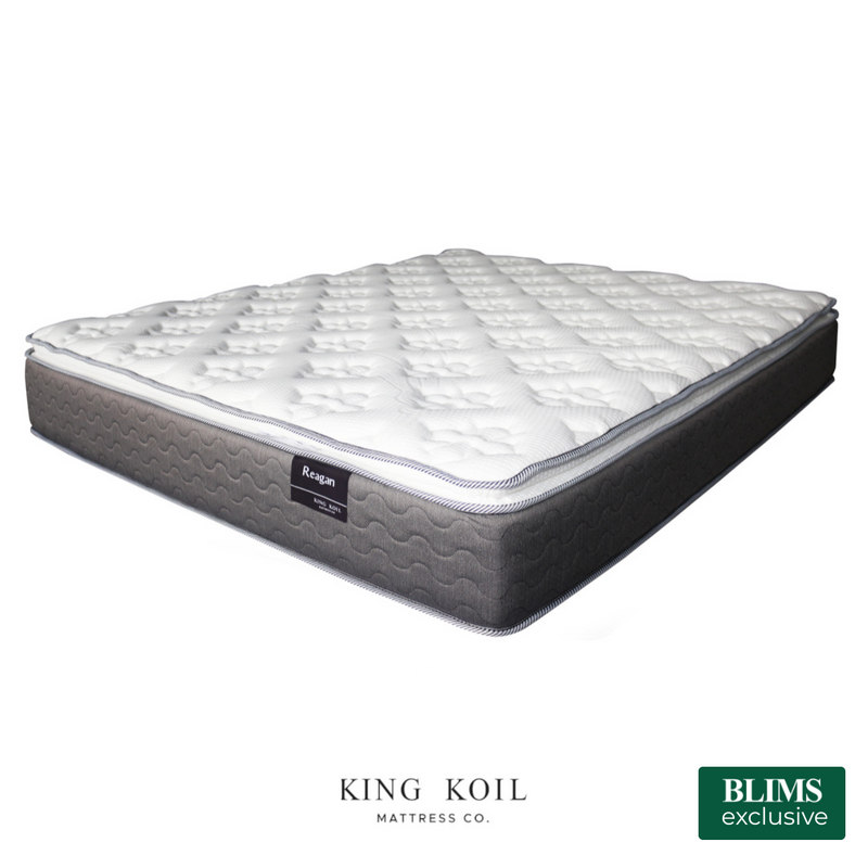 Mattress with white pillow-top surface and dark gray quilted sides
