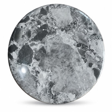 Round grey marble tabletop with natural stone speckling and veining